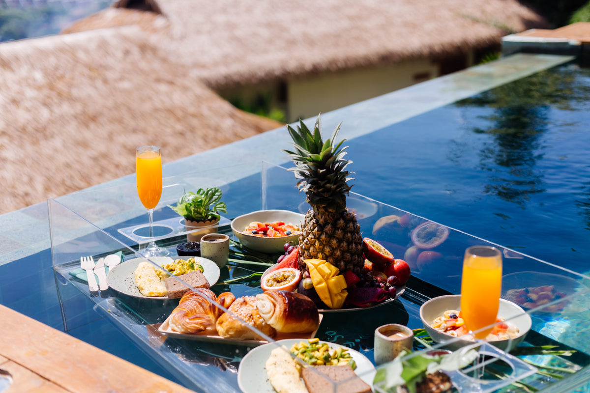 Luxvivendi Longevity – floating breakfast in a villa pool